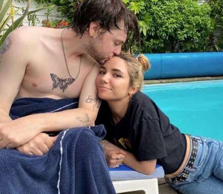 Musician, Finlay Munro Kemp with his wife, Charlotte Mallory together. 